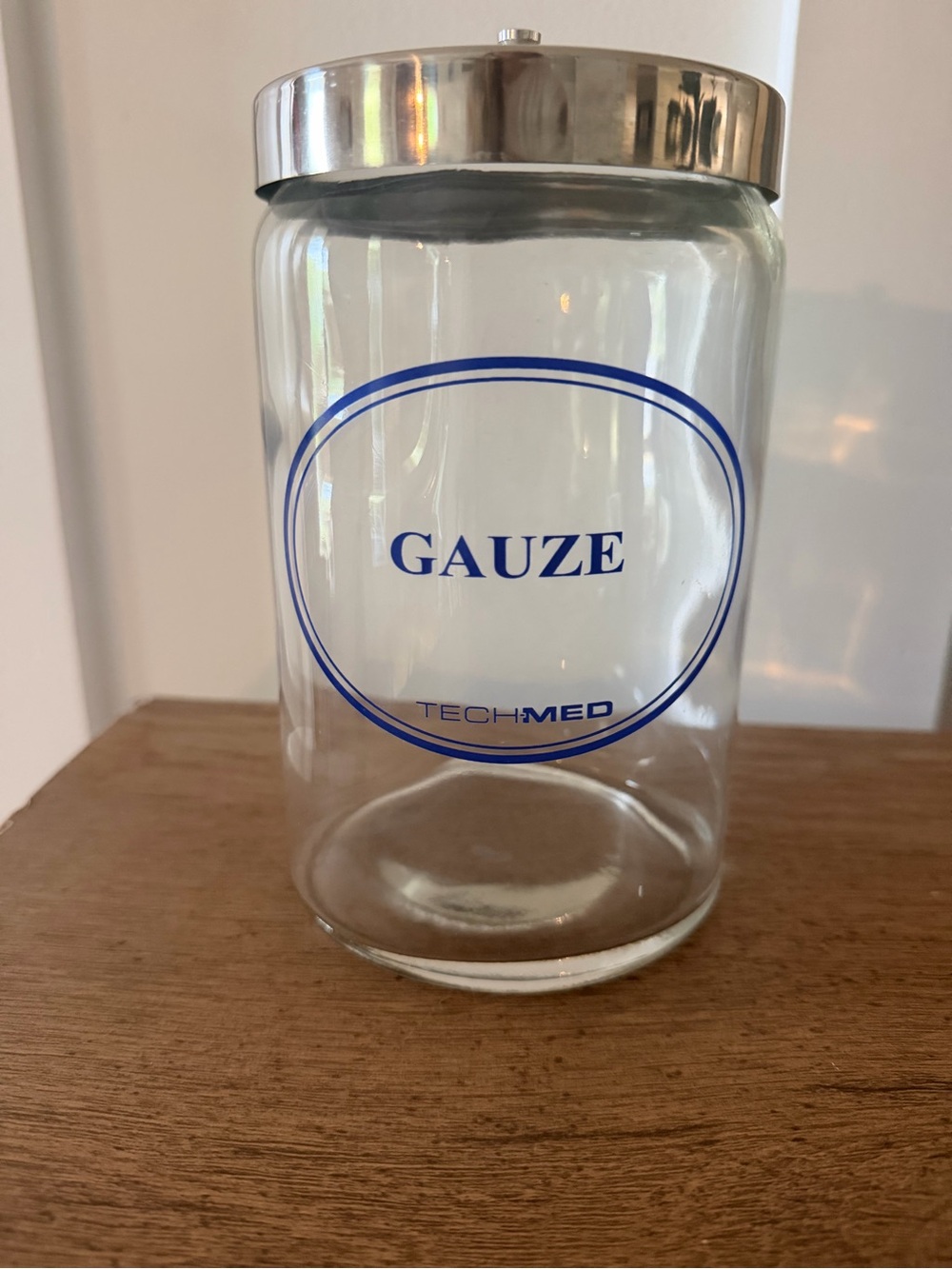 Elegant Clear Glass jar with gauze label and silver cap